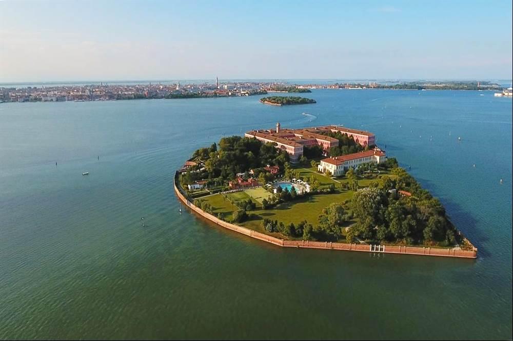 own island, you can spend your days doing activities including our thrilling helicopter ride over Venice and the lagoon, or spend time exploring and relaxing by the hotel's pool, enjoy a spa day,