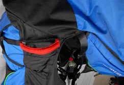 Page 11. Close the protective cover and tuck it inside its lower stretchable pocket. Position the handle in its folding sleeve. It may not protrude from the harness.