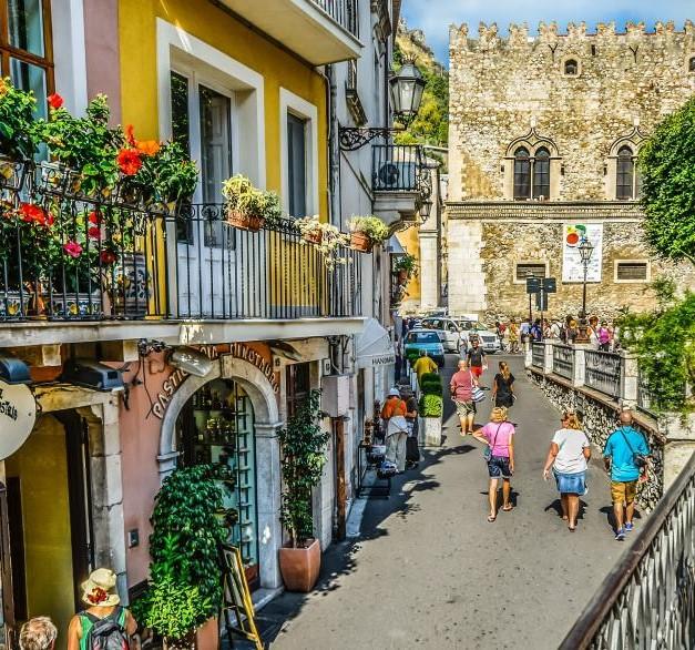 Through pleasant agricultural landscape, with breathtaking views of the coastline and glorious Etna, you reach charming Taormina.