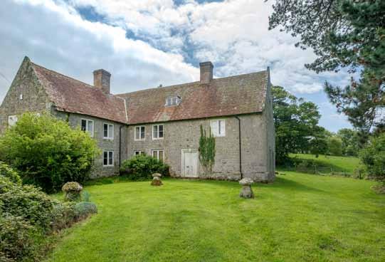 3 ½ hours) Seven bedroom Grade II listed Manor with gardens and outbuildings Separate Eight bedroom Farmhouse Range of modern and traditional farm buildings Two three bedroom cottages Approximately