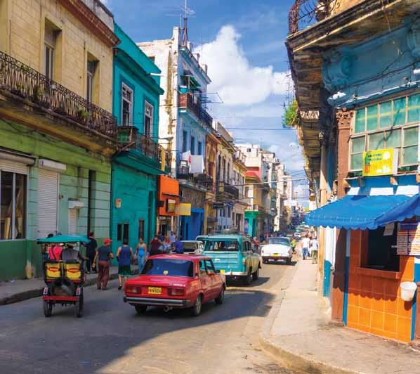 Cover photo: Vintage cars regarded as symbols of Havana s pop culture parked in a street in the city 50 cover story Grand Old Havana