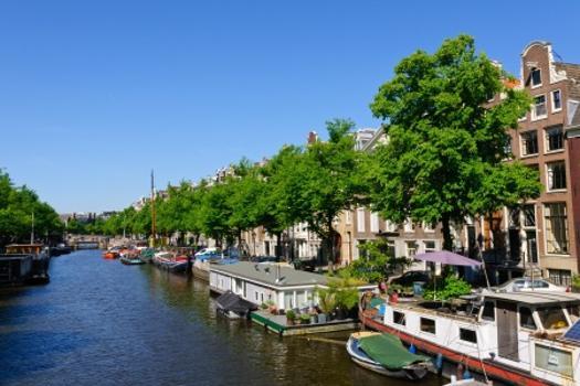 Join us on an optional excursion for both packages: Canal boat tour of enchanting Amsterdam at night.