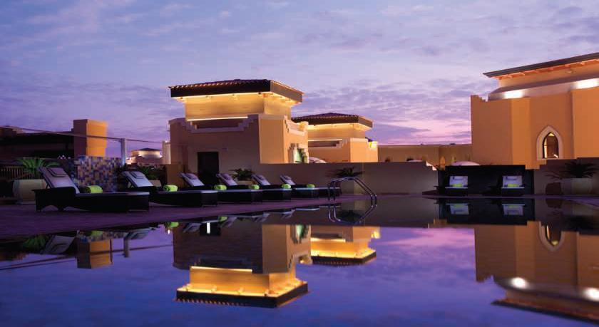 It overlooks its own private beach and is directly across the water from the Sheikh Zayed Grand Mosque.