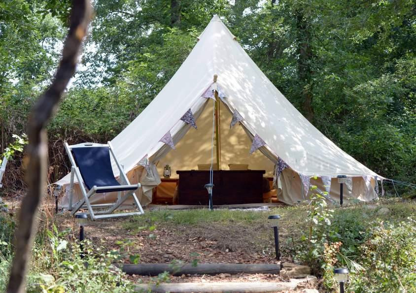 ECO-CAMPING Each bell tent comes with it s own eco-toilet, and access to a communal shower block 40 metres away. We provide torches and lanterns for use during your stay.