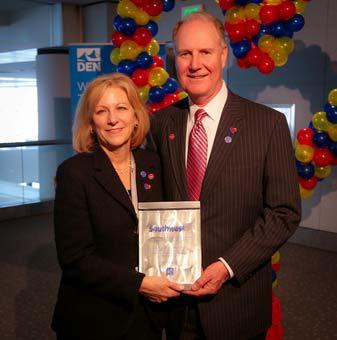 Page 3 of 9 Southwest Airlines Celebrates 10 Years at Denver International Airport Denver International Airport CEO Kim Day (left) stands beside Gary Kelly, Southwest's chairman, pesident and CEO, at