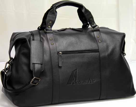Done in rich supple nappa leather with a spacious main compartment, a zip pocket inside, and metal feet at the