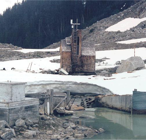 Figure 22. South Fork Cascade River gage house after it was hit by an avalanche. The gage house at the South Fork Cascade River gaging station was hit by an avalanche during the winter of 2.
