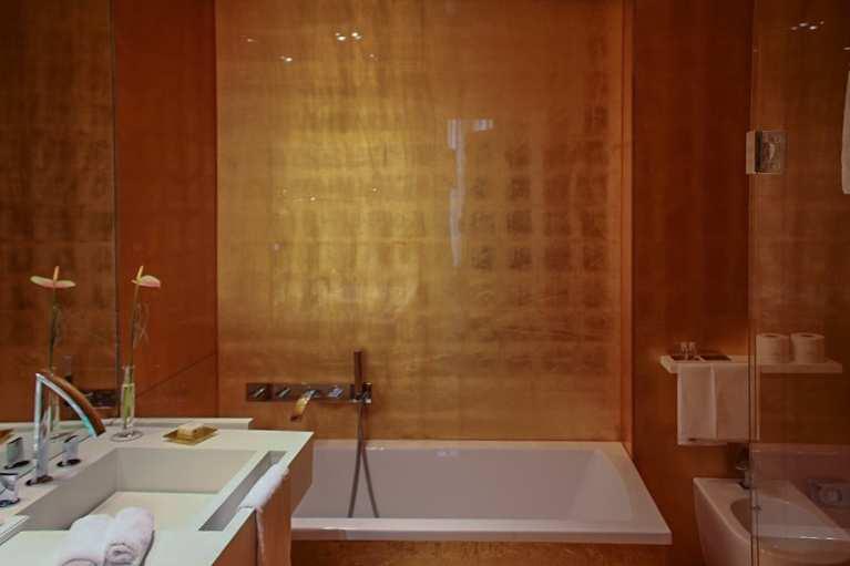 Gold Plated Bathrooms complete with large bath and shower. If you look around the hotel, it is like you are in a boutique hotel in old world Venice.