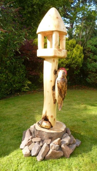 on her wall. Garden Stories The residents were very pleased with the new bird table that was made by Lee Coyle of Clyde Chainsaw Carvings.