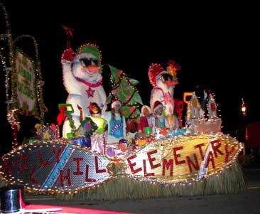 The parade was filled with festive music, a variety of creative floats, children singing their very best, and