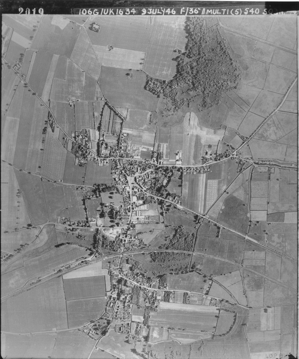 Fig. 5 - Aerial photograph of Acle taken in 1946 showing the compact nature of the town at the time of the Second World War. The Manor House pillbox [see Fig. 1] defended the open central area.