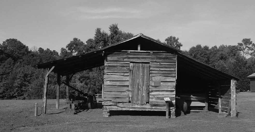 Tool Shed with Corn Crib was built circa 1900, originally located on the A.
