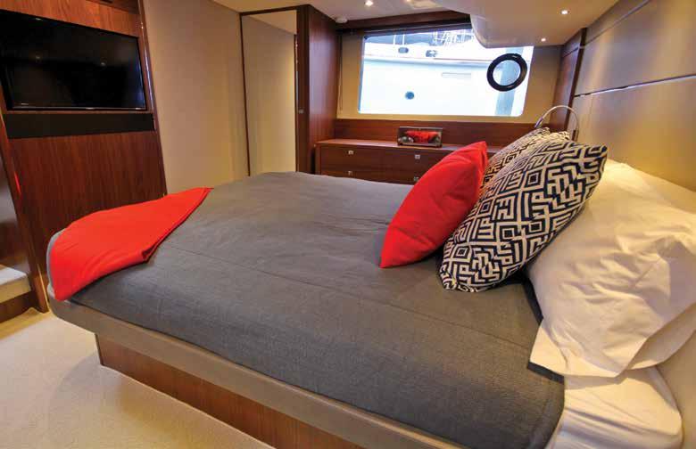 Her full beam master stateroom features a queen size bed,