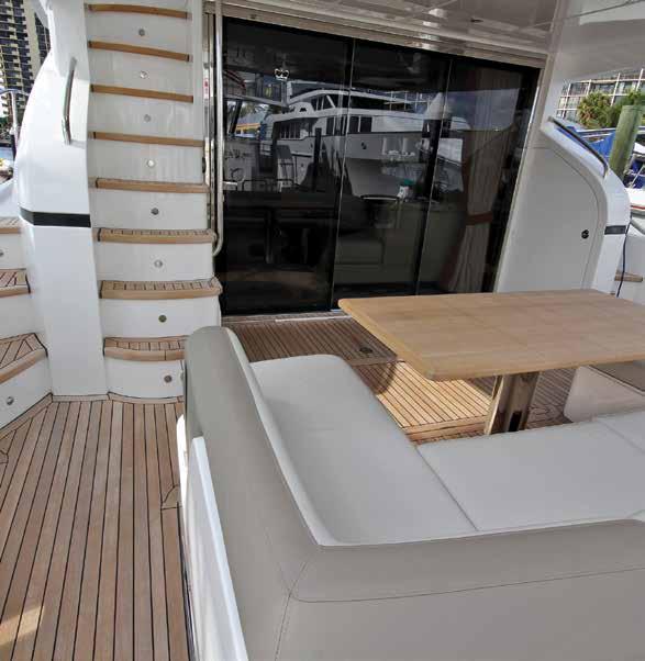 Moonlighter s open stern deck is accessible from the swim platform and