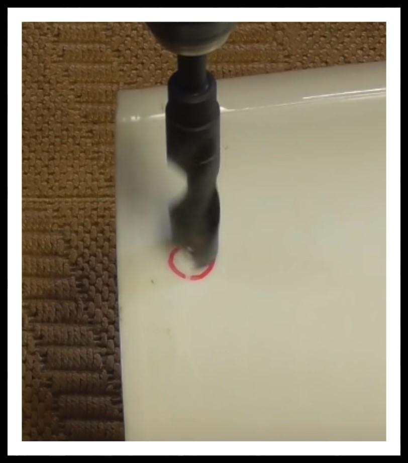 Use the faucet dispenser nut to locate the hole if you wish by holding it inside the bucket with enough room for it to clear the bottom of the