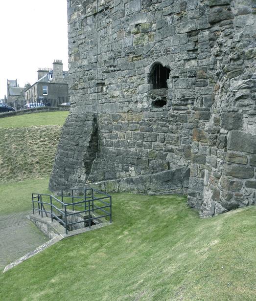St. Andrews Castle. The entrance to the besieger s mine, just to the east of the Fore Tower. View looking south, beyond the south curtain, to the outside of the castle.