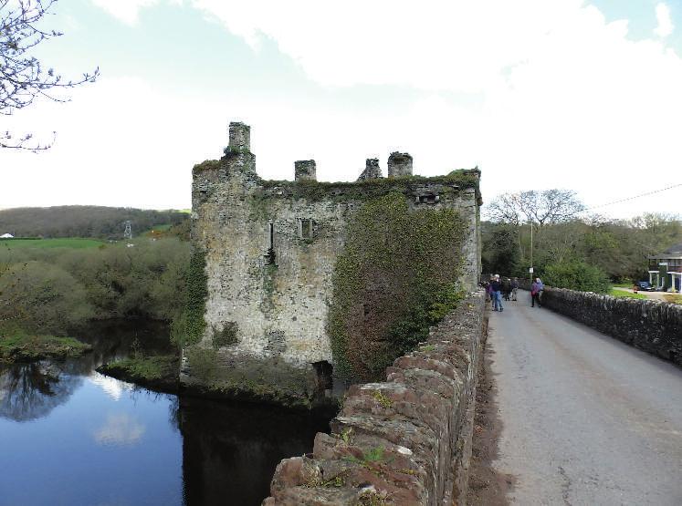 Carrigadrohid Castle. From the south, over the bridge. the west at ground, first and second-floor levels.