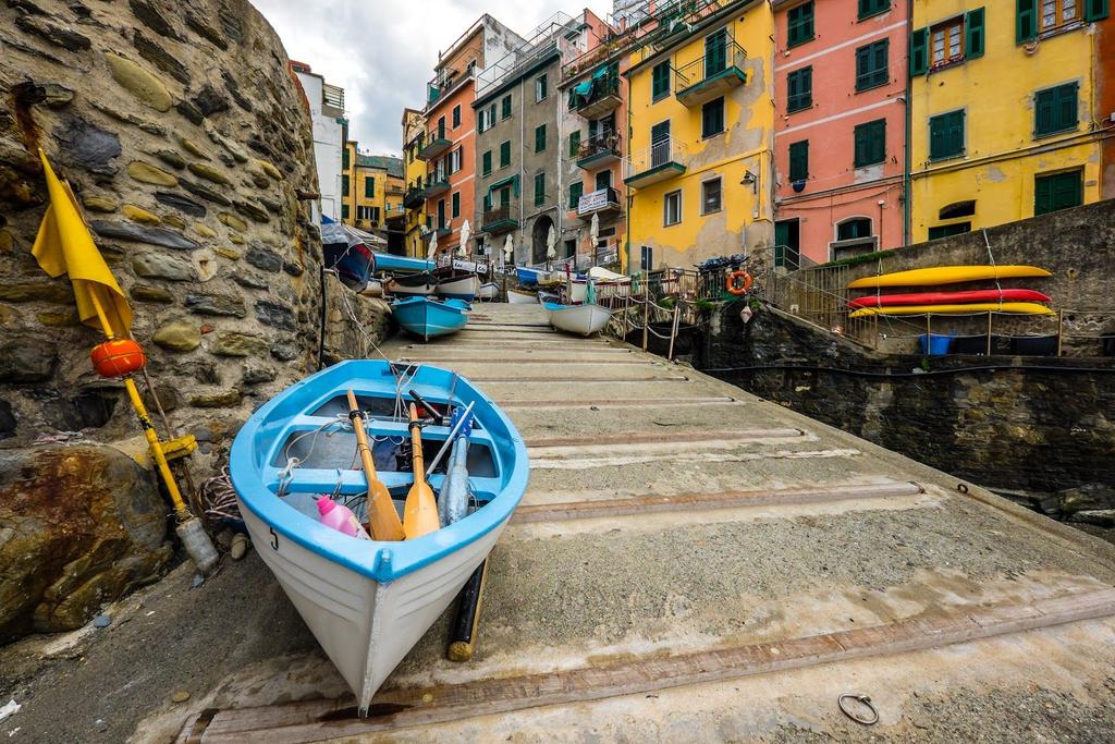 RIOMAGGIORE Riomaggiore is the southernmost of the Cinque Terre and one of the most compact and picturesque.