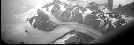 A valley glacier is one that occupies a valley, An ice cap is a mass of ice that occupies a high mountain area and flows outward in several directions.