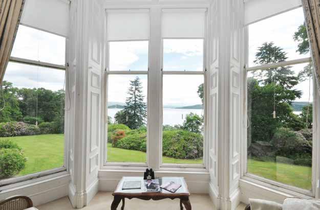 The setting, lying just off the main A82 which runs along the west side of Loch Lomond, is accessed via a lengthy tarmacadam driveway, to the private residence and visitors parking area.