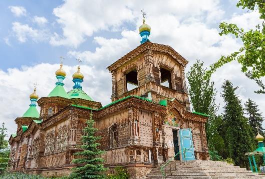 Continue with a 2-hour drive to the Russian town of Karakol and check in for a two-night stay.