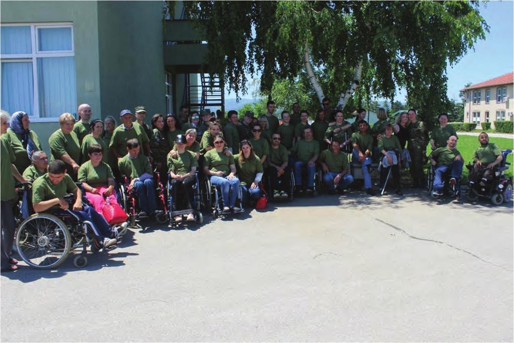 THE MEMBERS OF THE HANDICAP KOSOVA VISITED THE TRAINING AND DOCTRINE COMMAND IN FERIZAJ Joint picture of the participants in the barrack Skënderbeu in Ferizaj In order to provide the support to the