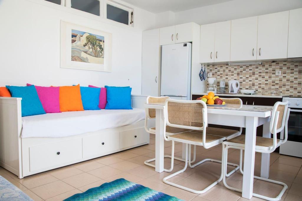 In Megalochori you will be accommodated in a private apartment https://www.airbnb.com/rooms/24088272.