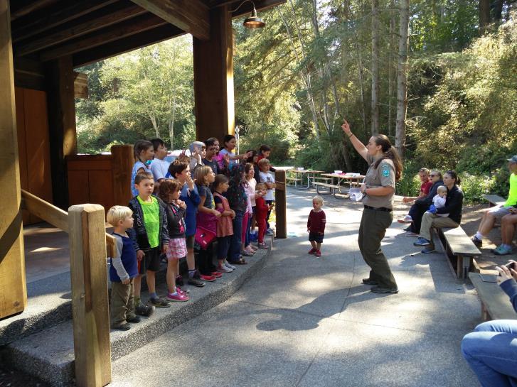 park. Junior Rangers are taught about respecting nature, park safety, natural history, and complete activities in order to earn their Junior Ranger badge. Nicky Becher inducts the last Jr.