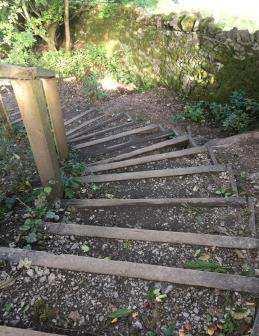 There are 25 fairly steep steps with timber risers with a crushed