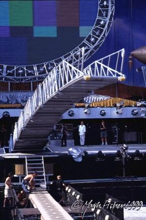 Because the stage could not be positively anchored due to the variety of venues and erection constraints, tanks filled with water were used as ballast to prevent overturning.