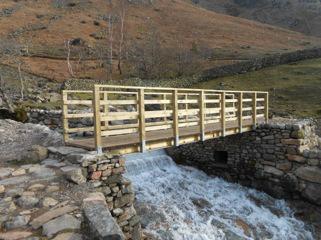 Go through a couple of gates and begin the ascent on the rocky path with Stickle