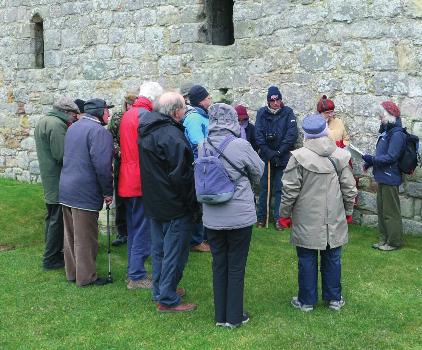 Lochleven Castle. Dr Penny Dransart, site guide for the castle, addressing a group of CSG delegates on Sunday afternoon.