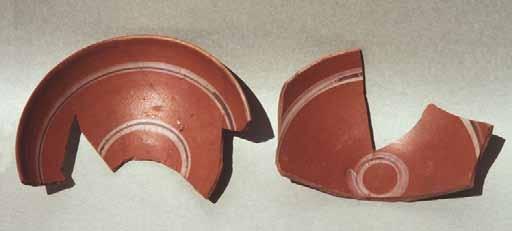 Some of the oldest examples of tableware, mostly thin-walled bowls, originated from archaeological fill preceding the construction of the Old Church and Building X.