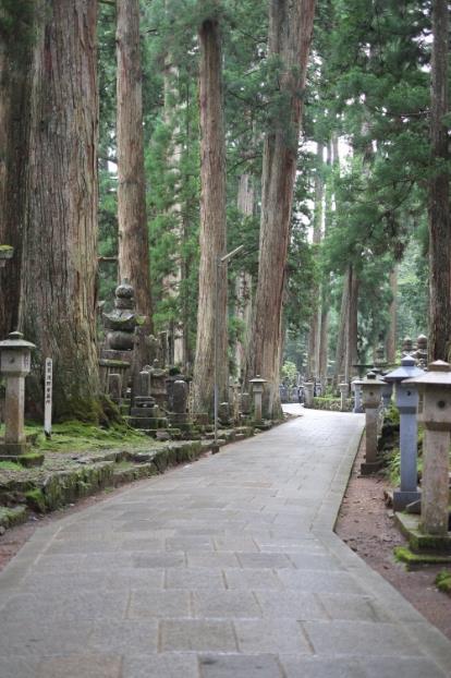 The 2km approach to Okunoin temple is through a forest of tall cedar trees, lined with over 200,000 tombstones, among them memorials to emperors, shoguns, samurai and poets.