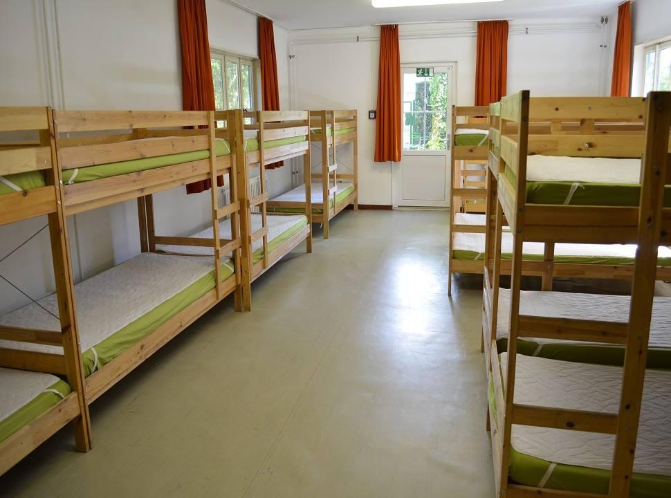 Nevertheless it is not a fancy hotel, but a youth centre with rather scout conditions: big rooms, common bathrooms, long