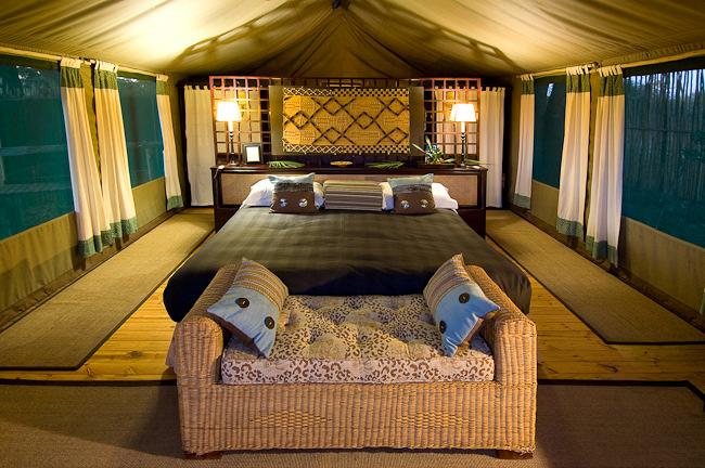 Accommodation at Duba Plains consists of just six roomy tents with an en-suite bathroom, an outside shower, and a veranda overlooking a gorgeous