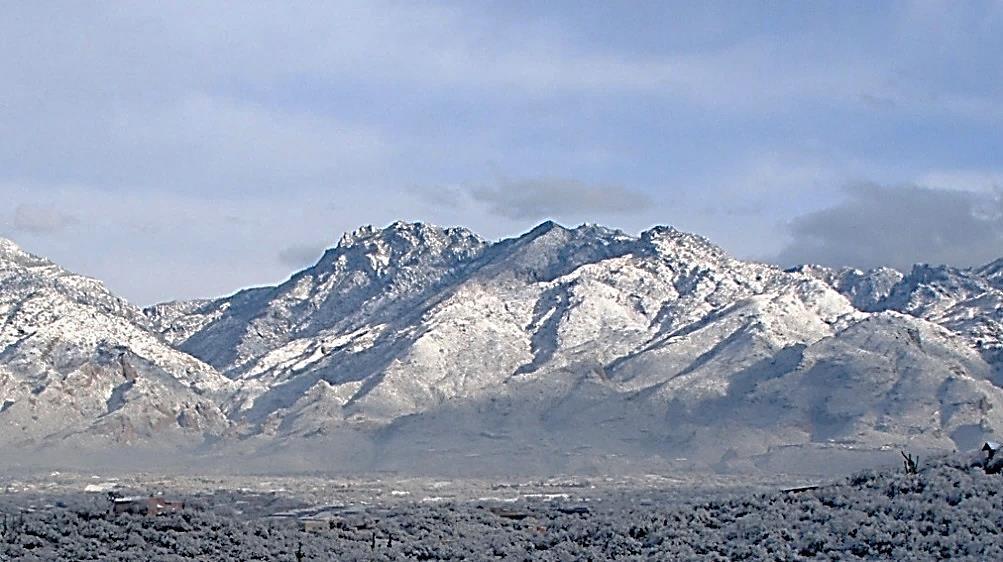 Historical Critical Resources Tucson residents appreciate the beauty of the Santa Catalina Mountains, shown here covered in snow.