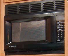 The optional Dometic microwave oven expands your cooking possibilities. Warranty Info.