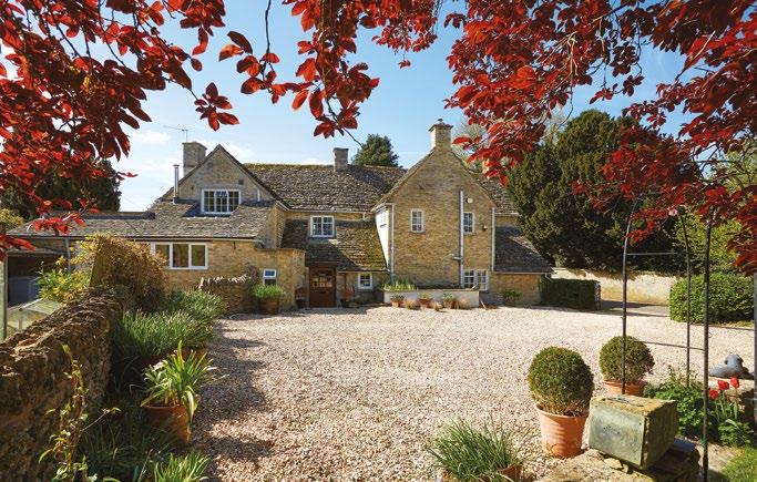 KENCOT NEAR BURFORD OXFORDSHIRE Secluded Cotswold family house with magnificent gardens, paddock land and outbuildings, near Burford,