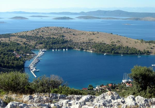 island of Murter. You can reach the island by a private boat or you can rent one. DUGI Dugi otok is primarily a place of relaxation and enjoyment.