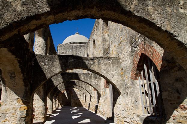 Beautiful stone arches line the walkways at mission San Jose in San Antonio.