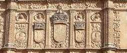 In the middle, we can see three shields; on the left hand side the double-headed eagle (Carlos I),