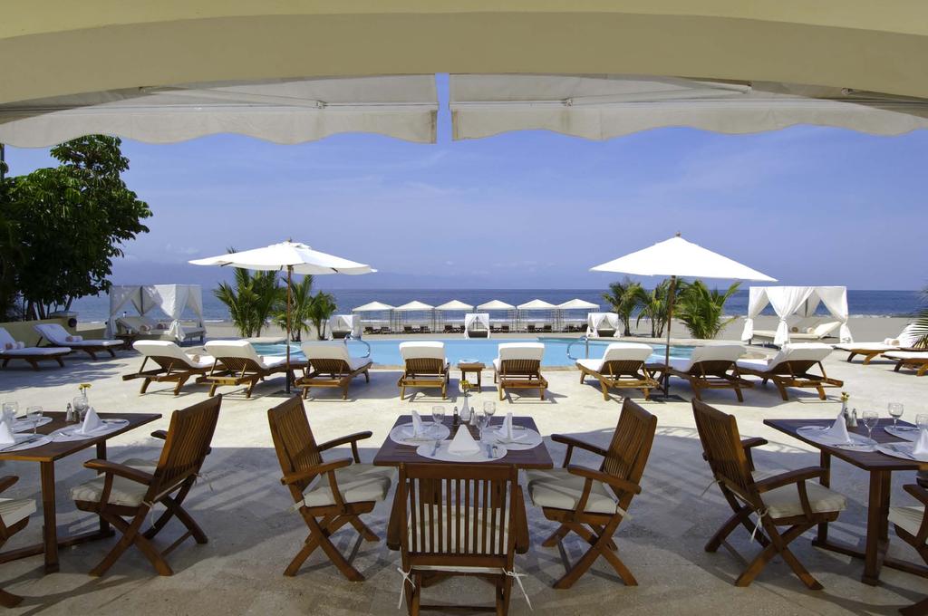 CASA VELAS A boutique hotel and ocean club nestled on the greens of Marina Vallarta s 18-hole golf course, is a member of The Leading Small Hotels of the World and a recipient of the AAA Four Diamond
