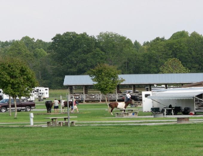 watering troughs for your mounts. For riders Wranglers offers clean showers and restrooms, campsites, picnic tables, fire rings, and an activities court.