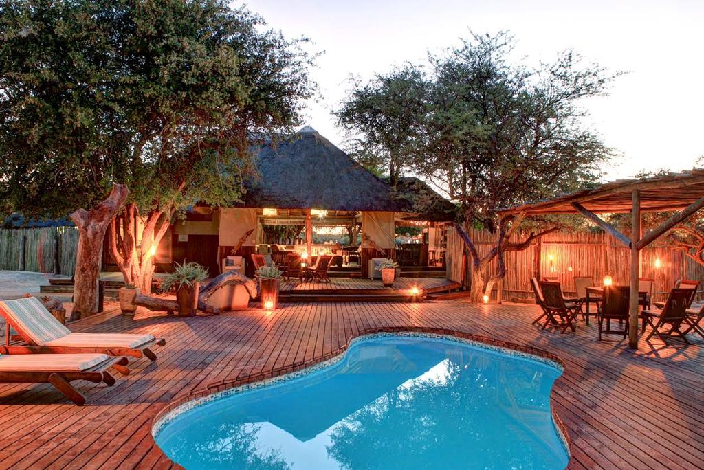 UNWIND in a natural oasis THE SETTING OF HAINA KALAHARI LODGE IS CLASSICALLY AFRICAN, RELAXED AND INFORMAL.