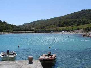 In the east end the small hamlet of Povlja is situated, and in the west end you will find a series of small, protected bays and a couple of restaurants with buoys and piers.