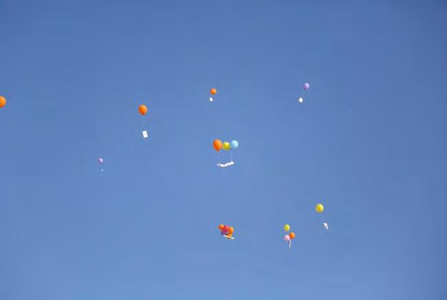 Brainwashing campers with the "right of return" of the Palestinian refugees 7 Right: Balloons launched at the opening ceremony of the summer camps.