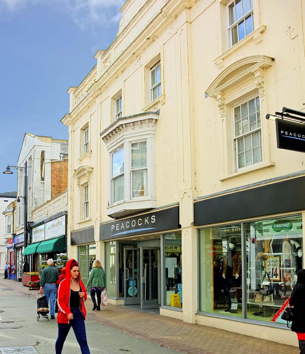 INVESTMENT CONSIDERATIONS n Prominent town centre retail investment with residential uppers n Ground and part 1st floor retail unit of 5,754 sq ft (535 sq m) n 5 self-contained 1 bed apartments to