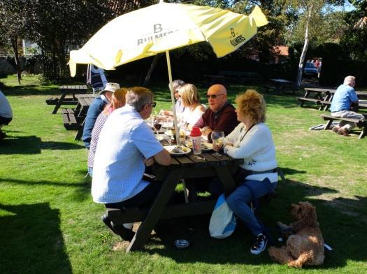 The beer garden in the Village Inn was busy when we first got there but, we found a row of picnic benches together without resorting to the