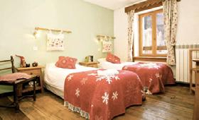 Accommodation In the chalet itself, there are five comfortable bedrooms on two floors, all individually decorated in a chalet-style with wooden floors, lovely mountain views and en-suite bathrooms.